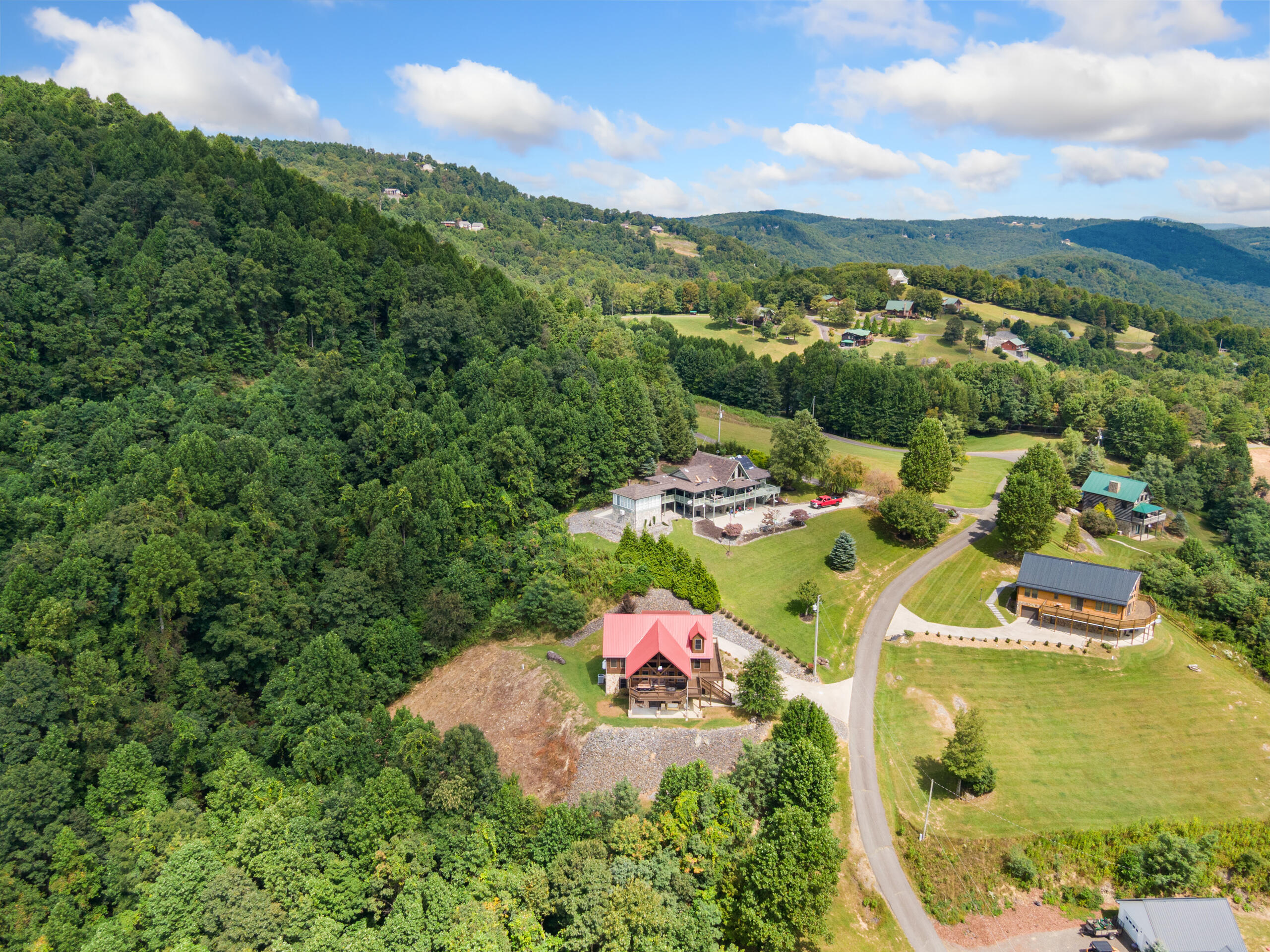 316 Reflections Pt Trail Fancy Gap, VA 24328 - Photo 73 of 78 an aerial view of residential houses with outdoor space