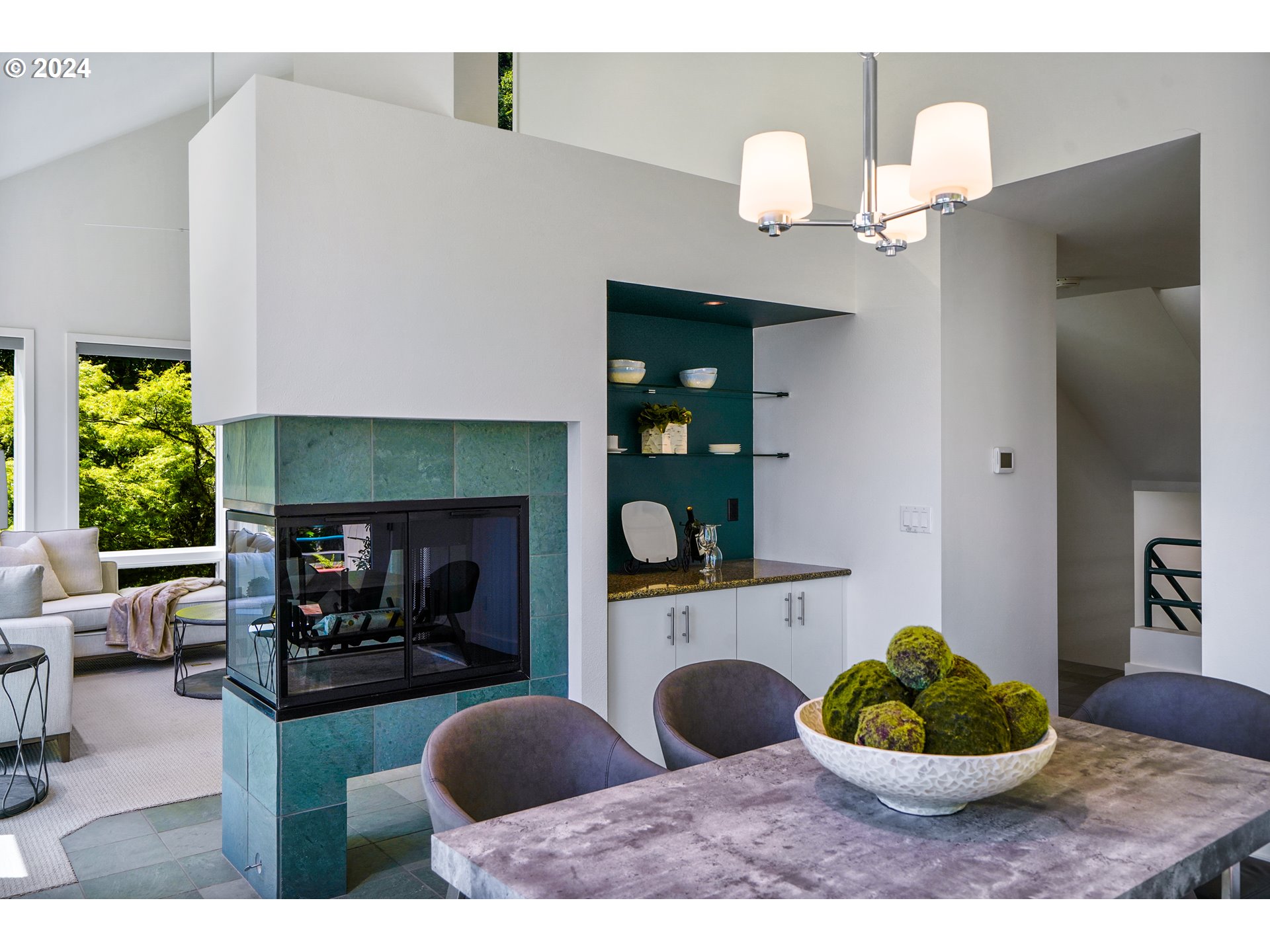 6815 Northwest Concord Drive Corvallis, OR 97330 - Photo 6 of 48 a living room with furniture a fireplace and a large mirror