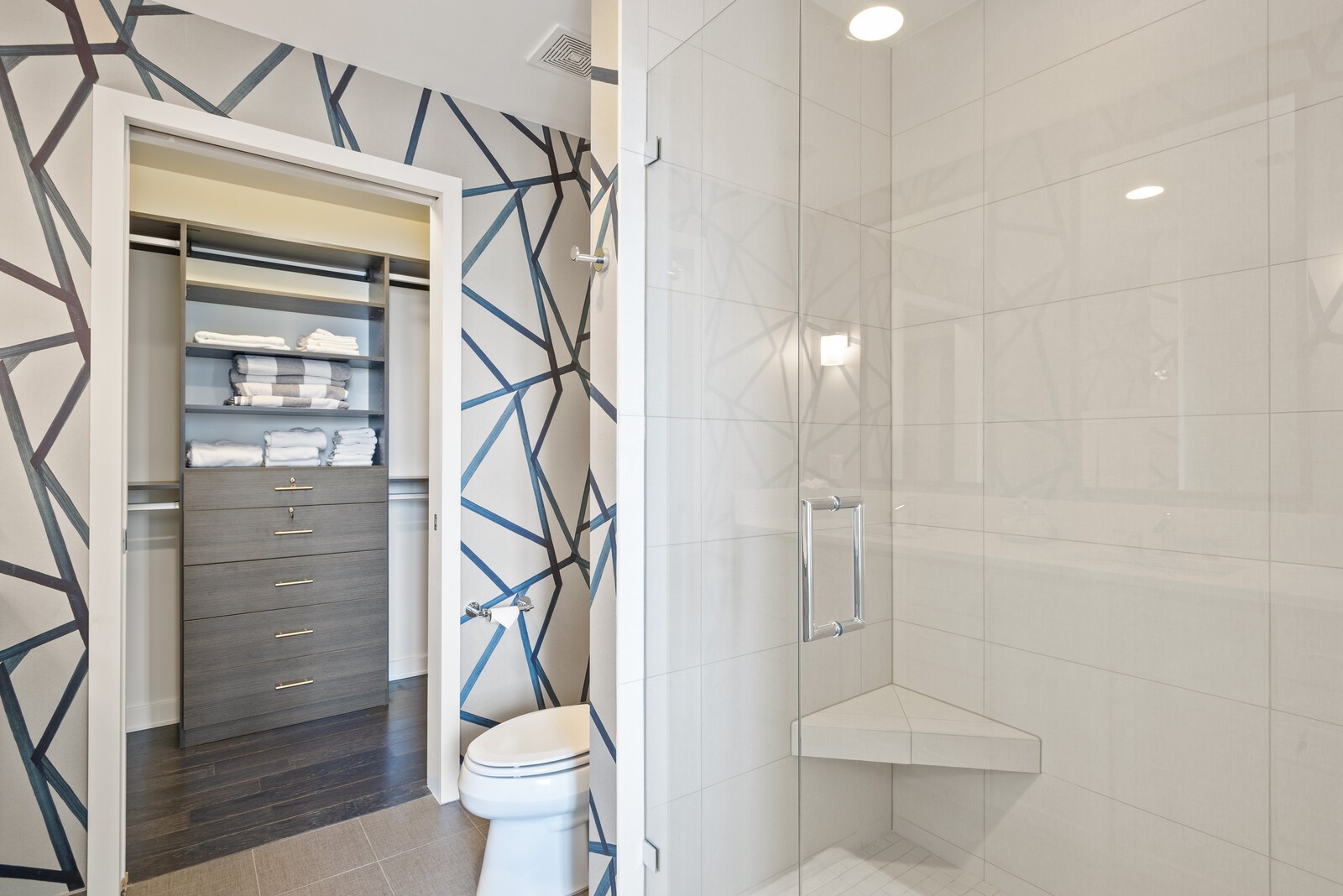 1212 Laurel Street, Unit 1815 Nashville, TN 37203 - Photo 12 of 26 a bathroom with a toilet and a shower