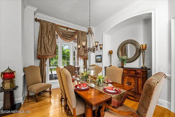 a kitchen with a stove and a refrigerator