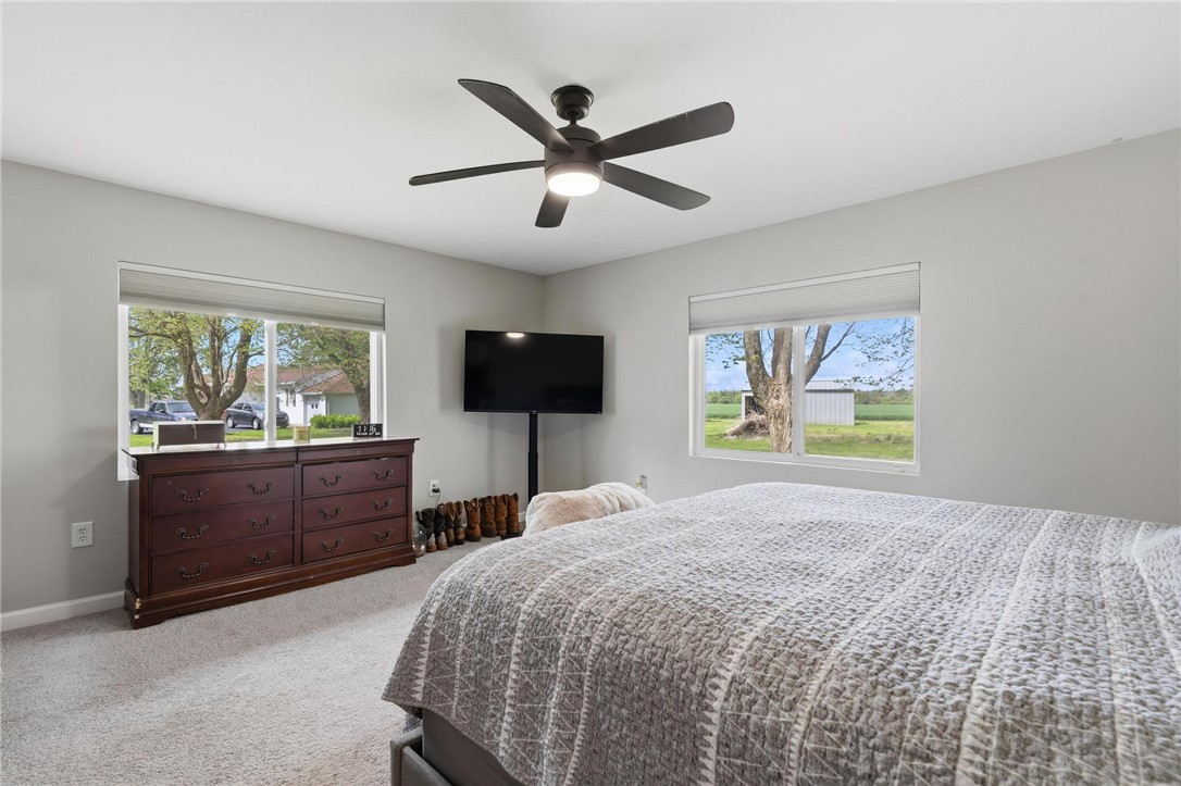 2950 Fairfield Pike Springfield, OH 45502 - Photo 25 of 48 This spacious bedroom offers ample natural light and a comfortable retreat with scenic outdoor views.