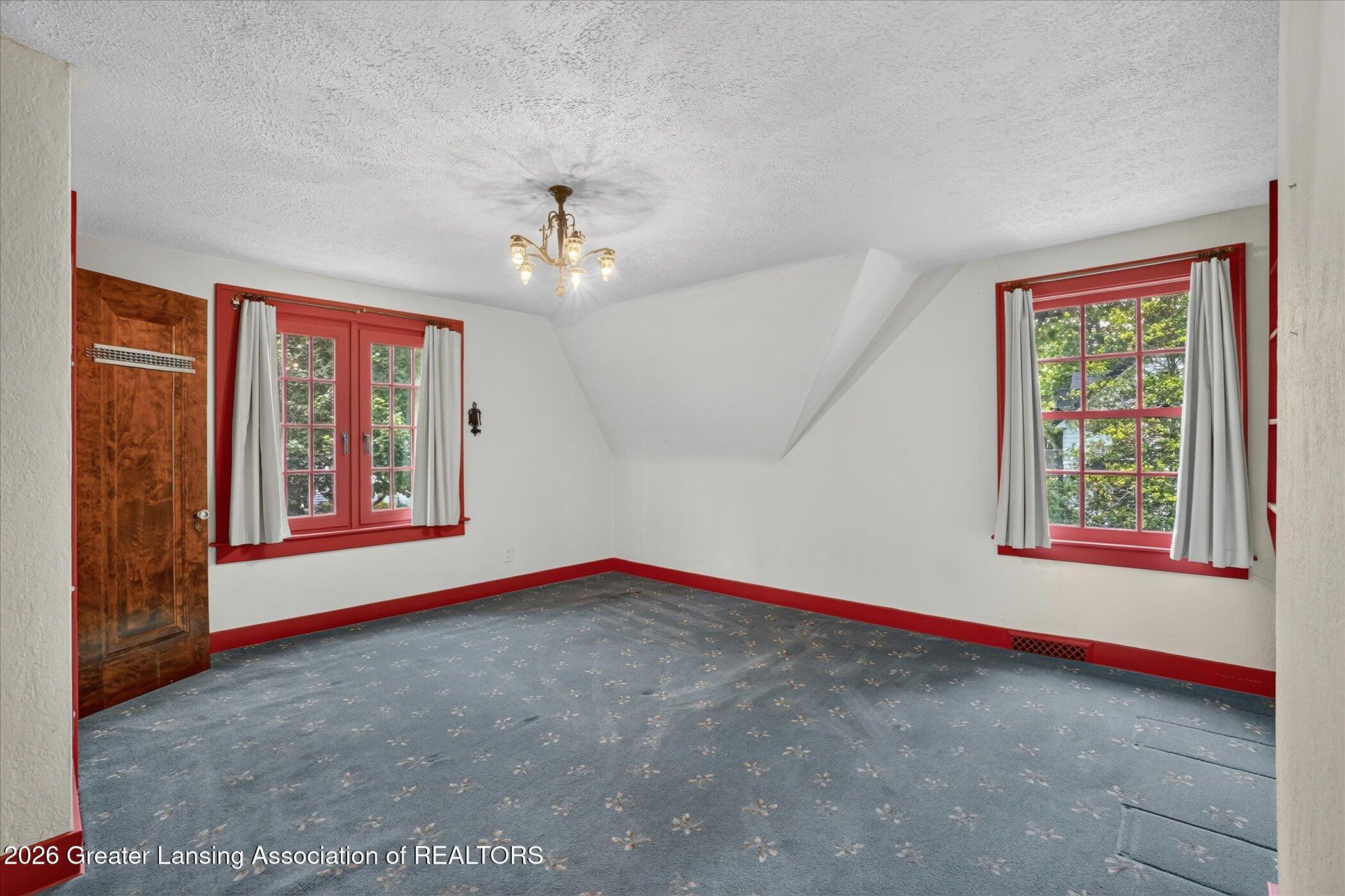 1716 Tecumseh River Road Lansing, MI 48906 - Photo 23 of 51 Primary Bedroom