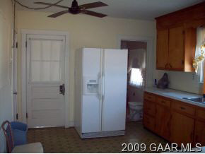 374 Battlefield Road Waynesboro, VA 22980 - Photo 5 of 12 a kitchen with stainless steel appliances granite countertop a refrigerator and a sink