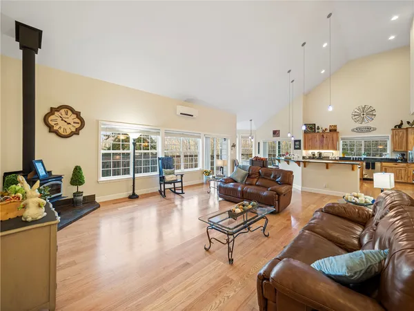 a view of entryway livingroom and hall
