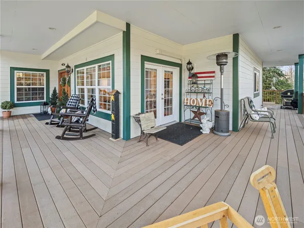 a view of wooden house with a large window