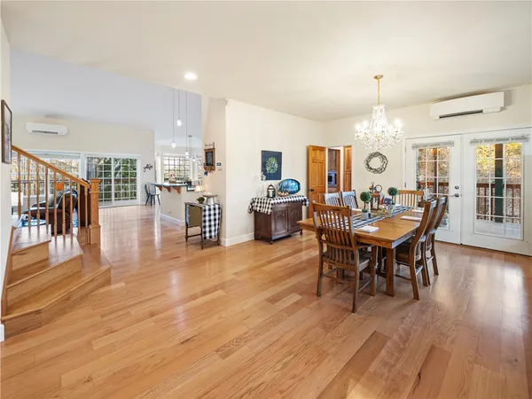 a large kitchen with lots of counter space and stainless steel appliances