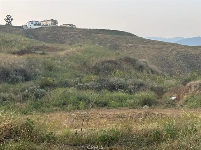 a view of a mountain range with trees