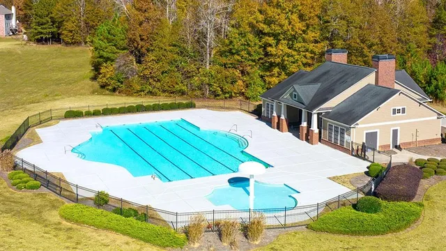 a view of a swimming pool with an outdoor space
