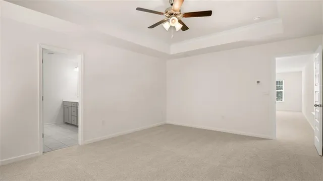 a bathroom with double sink and a mirror