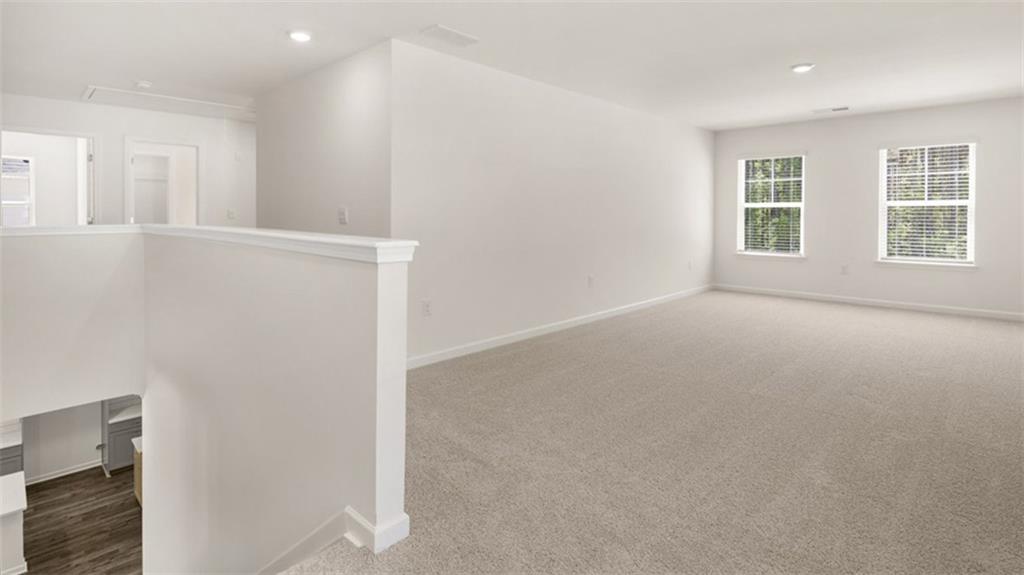 13586 Whitman Lane Covington, GA 30014 - Photo 38 of 50 an empty room with windows