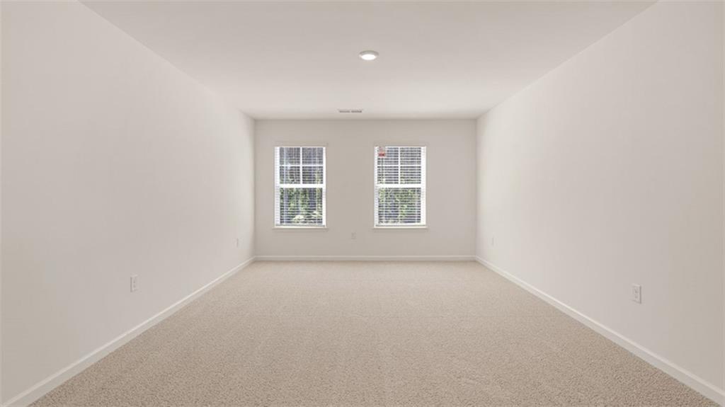 13586 Whitman Lane Covington, GA 30014 - Photo 39 of 50 an empty room with windows