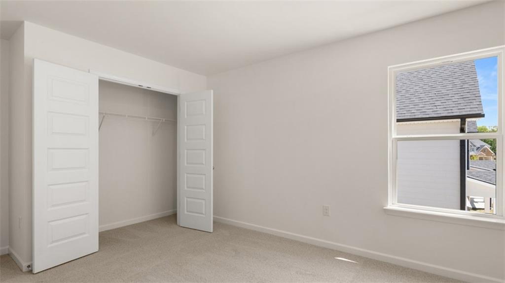 13586 Whitman Lane Covington, GA 30014 - Photo 46 of 50 an empty room with windows and closet