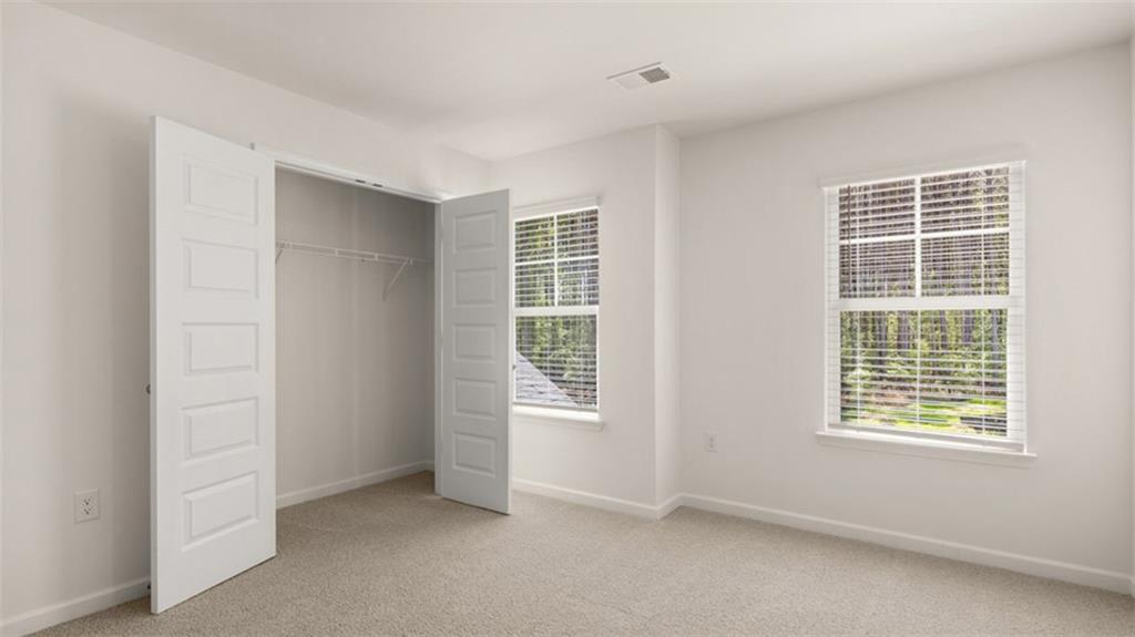 13586 Whitman Lane Covington, GA 30014 - Photo 49 of 50 an empty room with windows