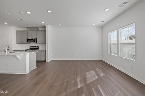 a view of kitchen with wooden floor