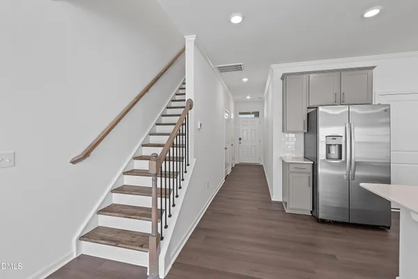 a view of a hallway with staircase