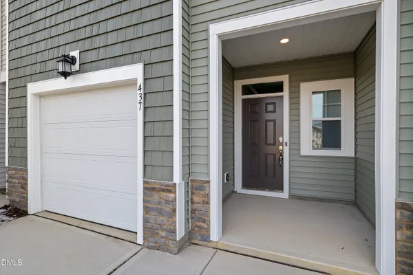 a view of a hallway with the wooden floor