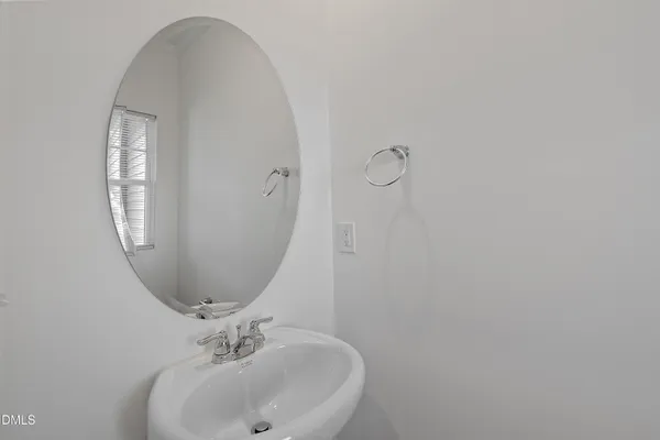 a kitchen with granite countertop a stove top oven and cabinets