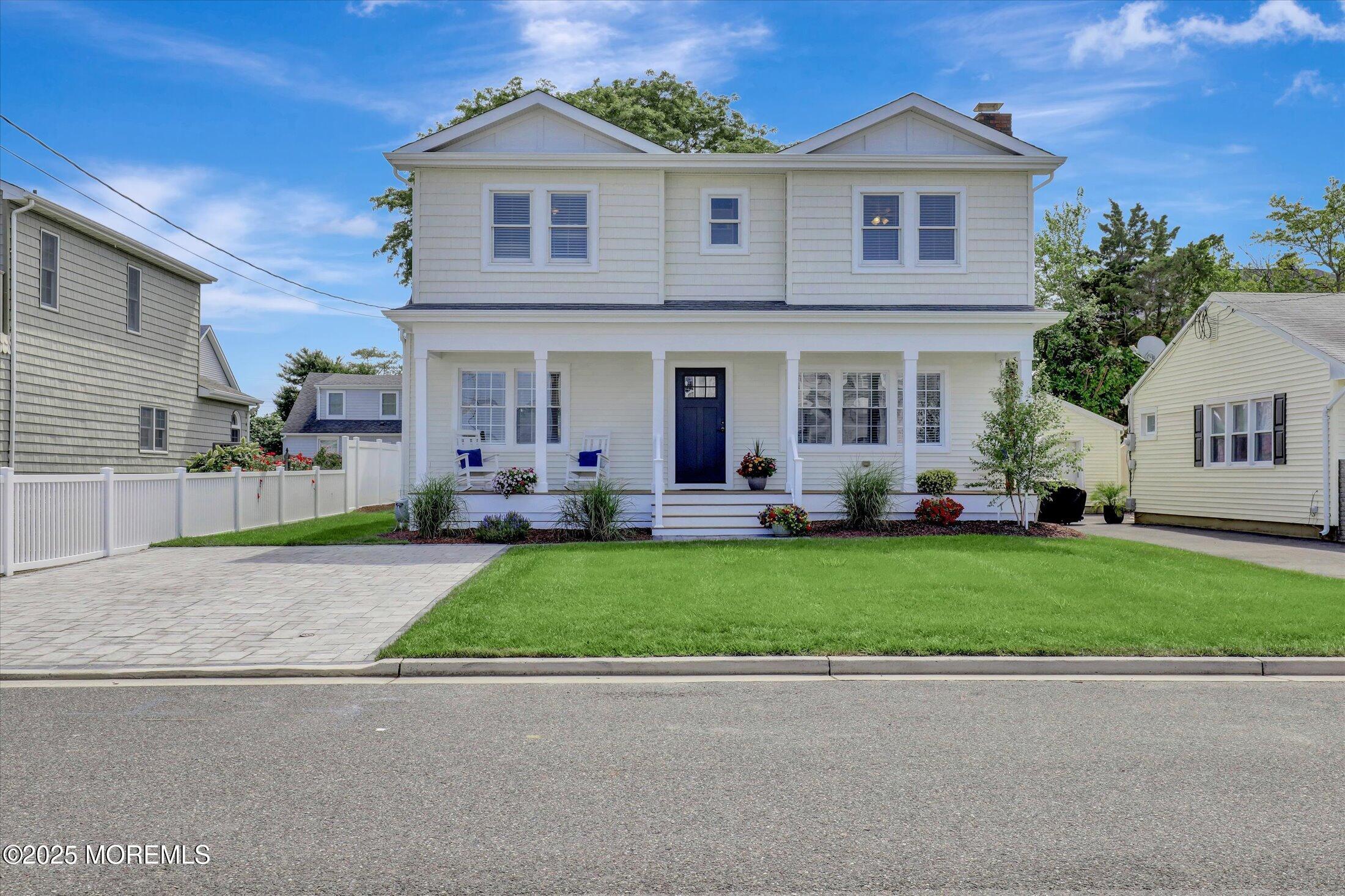 1810 Shore Boulevard Point Pleasant, NJ 08742 - Photo 2 of 49 a front view of house with yard and green space