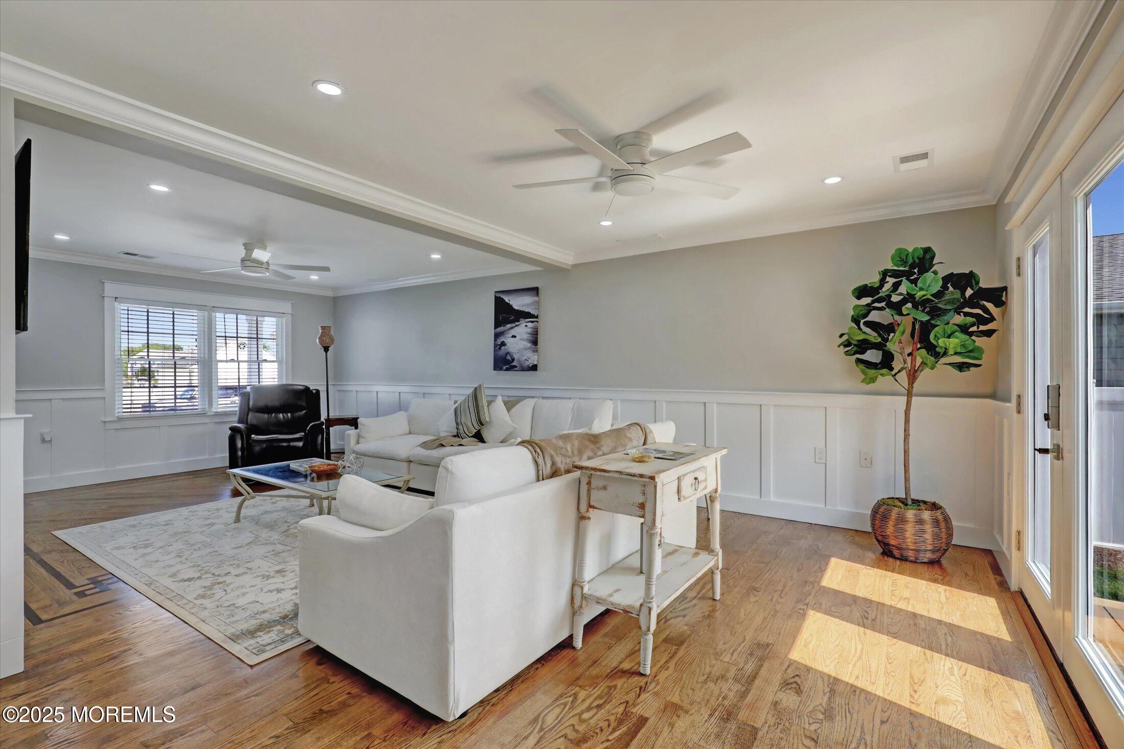 1810 Shore Boulevard Point Pleasant, NJ 08742 - Photo 23 of 49 a living room with furniture and a table