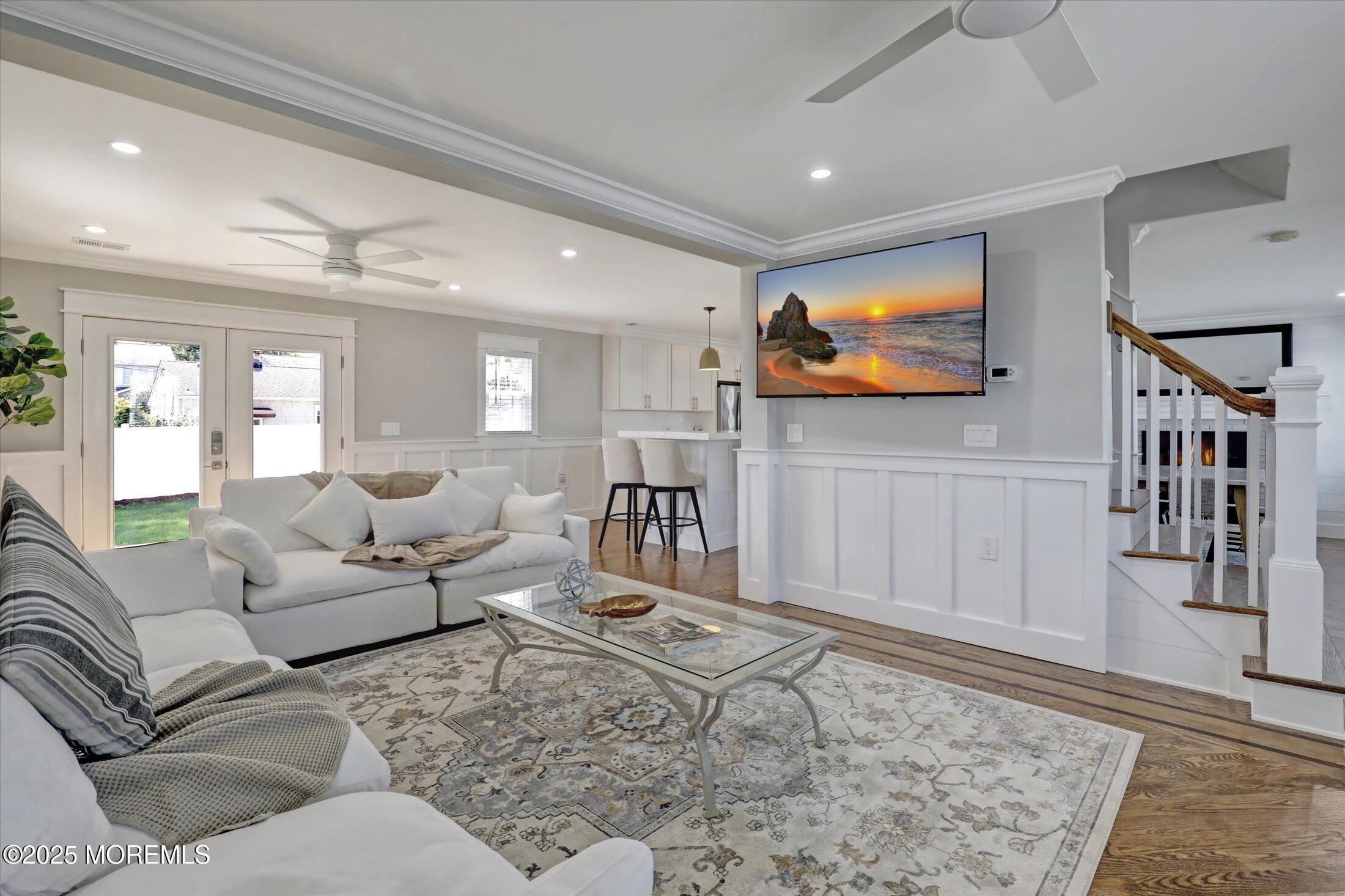 1810 Shore Boulevard Point Pleasant, NJ 08742 - Photo 25 of 49 a living room with furniture and a flat screen tv