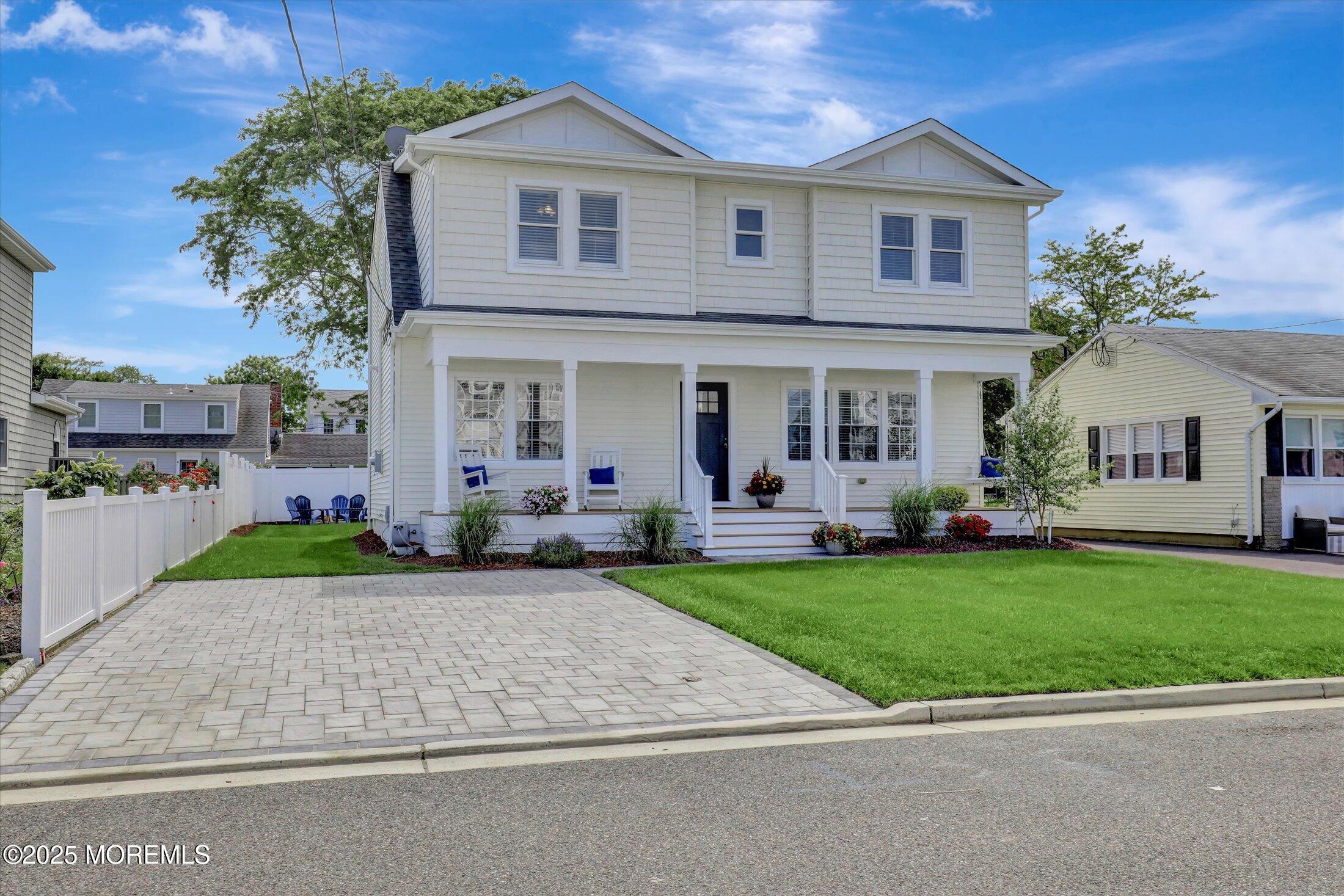 1810 Shore Boulevard Point Pleasant, NJ 08742 - Photo 3 of 49 a front view of a house with garden