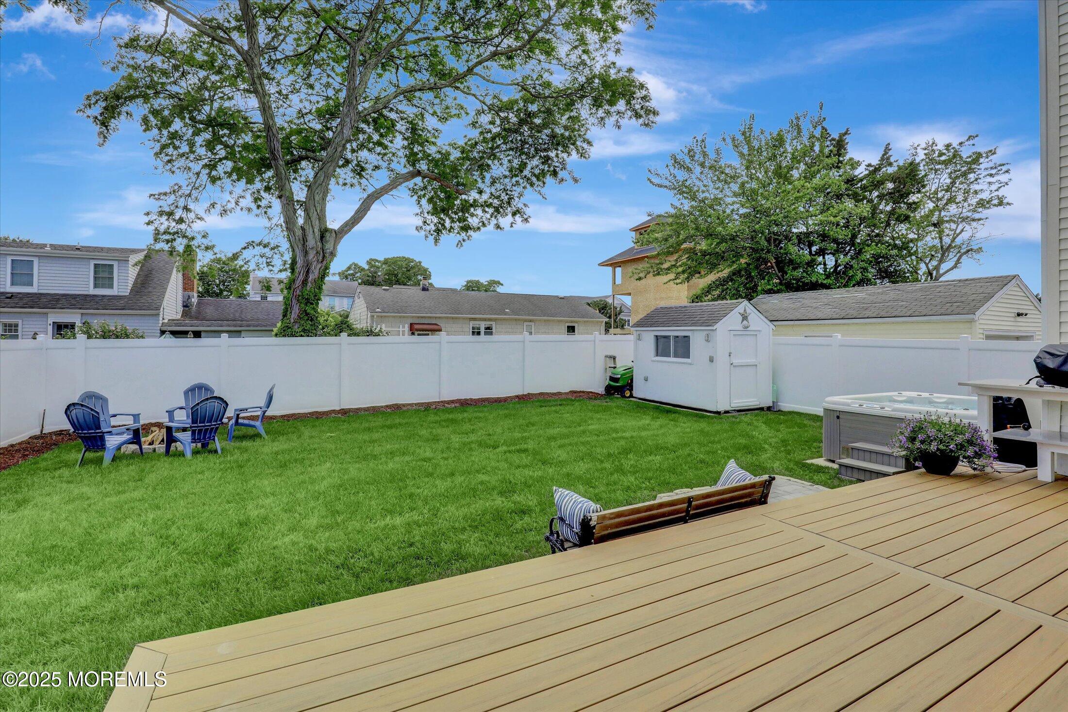 1810 Shore Boulevard Point Pleasant, NJ 08742 - Photo 46 of 49 a view of a backyard with sitting area