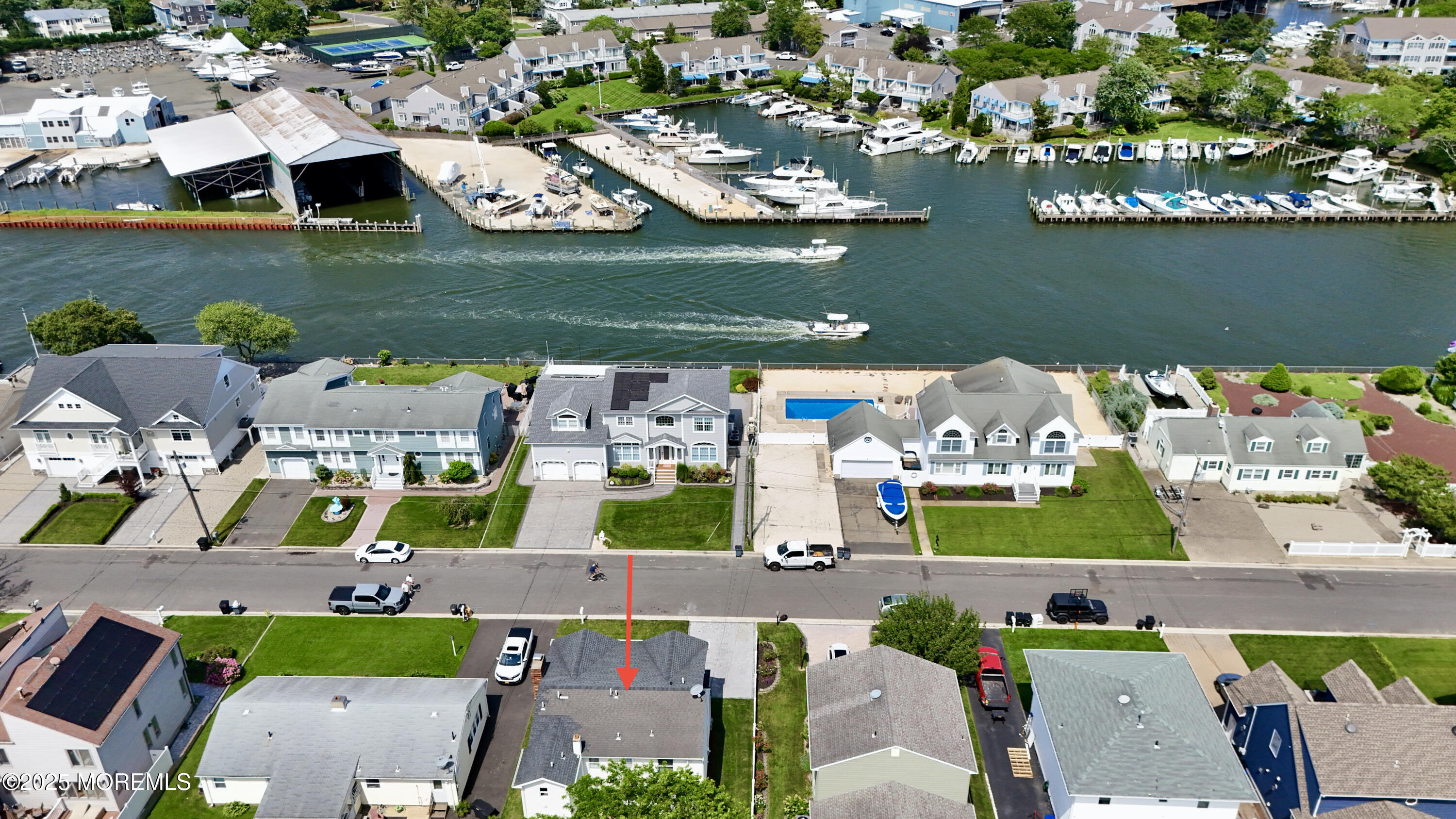 1810 Shore Boulevard Point Pleasant, NJ 08742 - Photo 7 of 49 an aerial view of residential houses with outdoor space and swimming pool