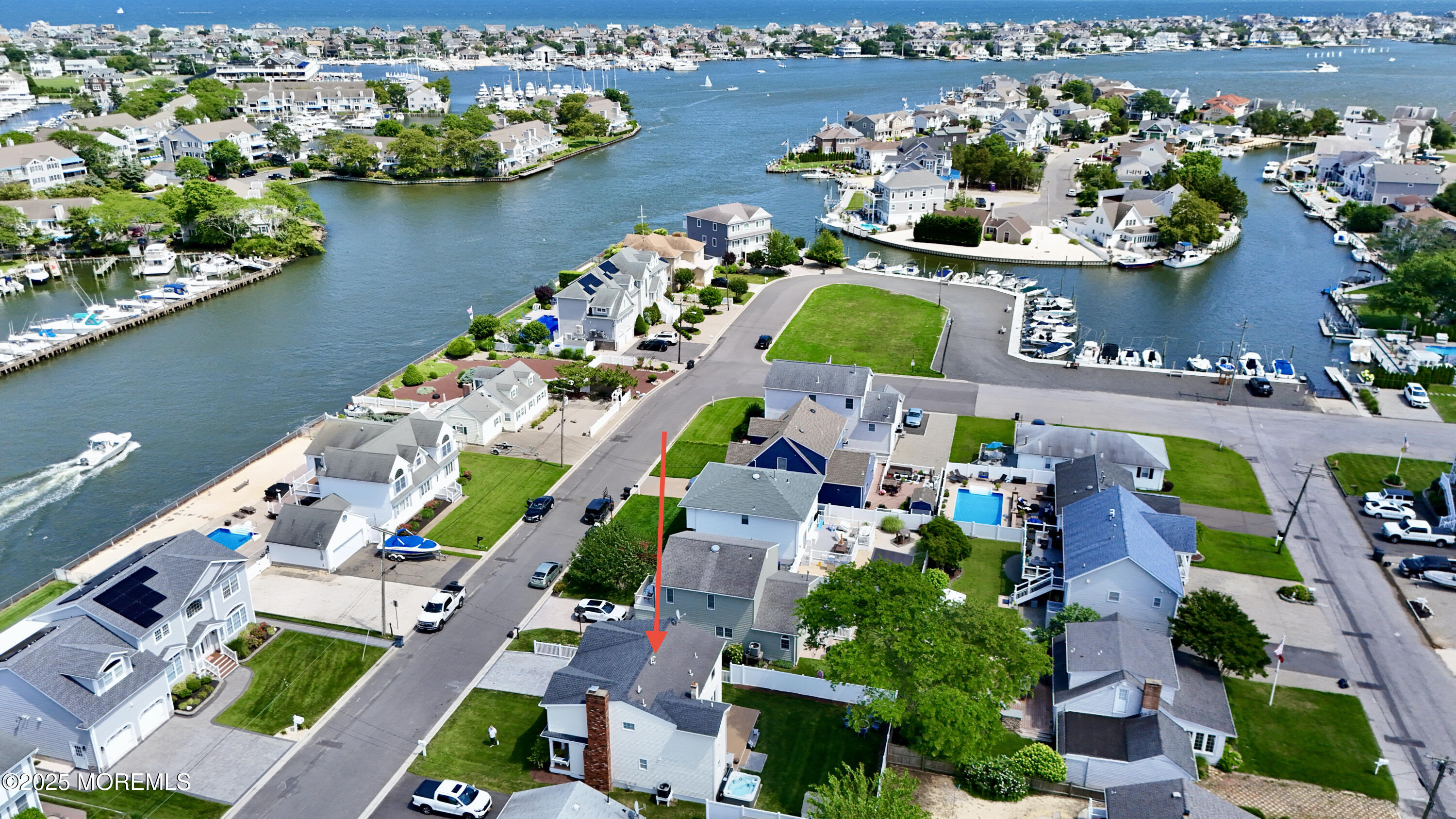 1810 Shore Boulevard Point Pleasant, NJ 08742 - Photo 10 of 49 an aerial view of house with yard swimming pool and ocean view