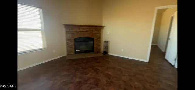 a room with a bed and a window