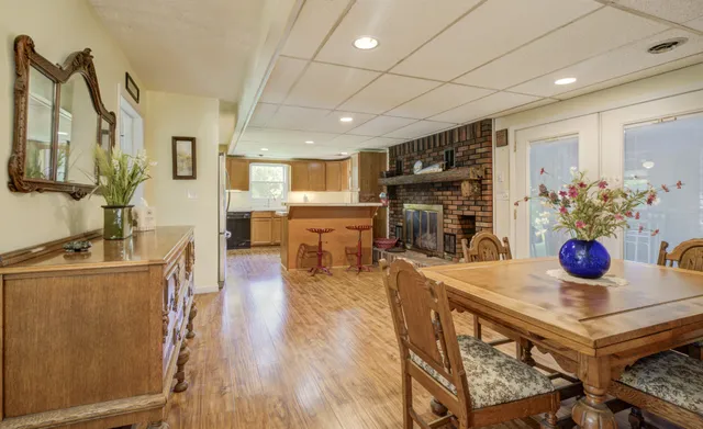 a living room with furniture a ceiling fan and a rug