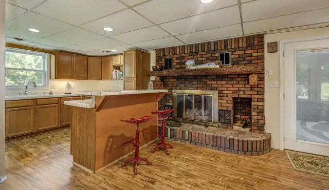 a bedroom with furniture and a window