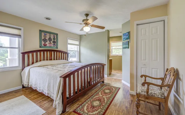 a view of kitchen with furniture and wooden floor
