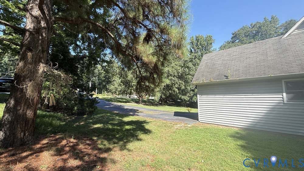 320 Wilson Road Danville, VA 24541 - Photo 16 of 17 Exterior featuring light gray siding, a shingle ro