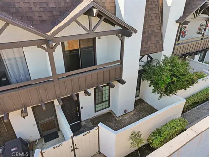 a view of kitchen with sink microwave and refrigerator
