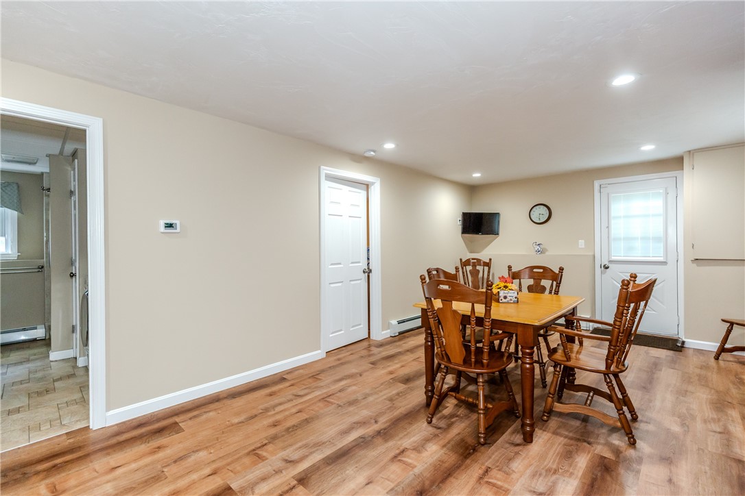 99 Tower Hill Road Cumberland, RI 02864 - Photo 30 of 43 Spacious lower-level dining area offering plenty of room for family meals and entertaining.