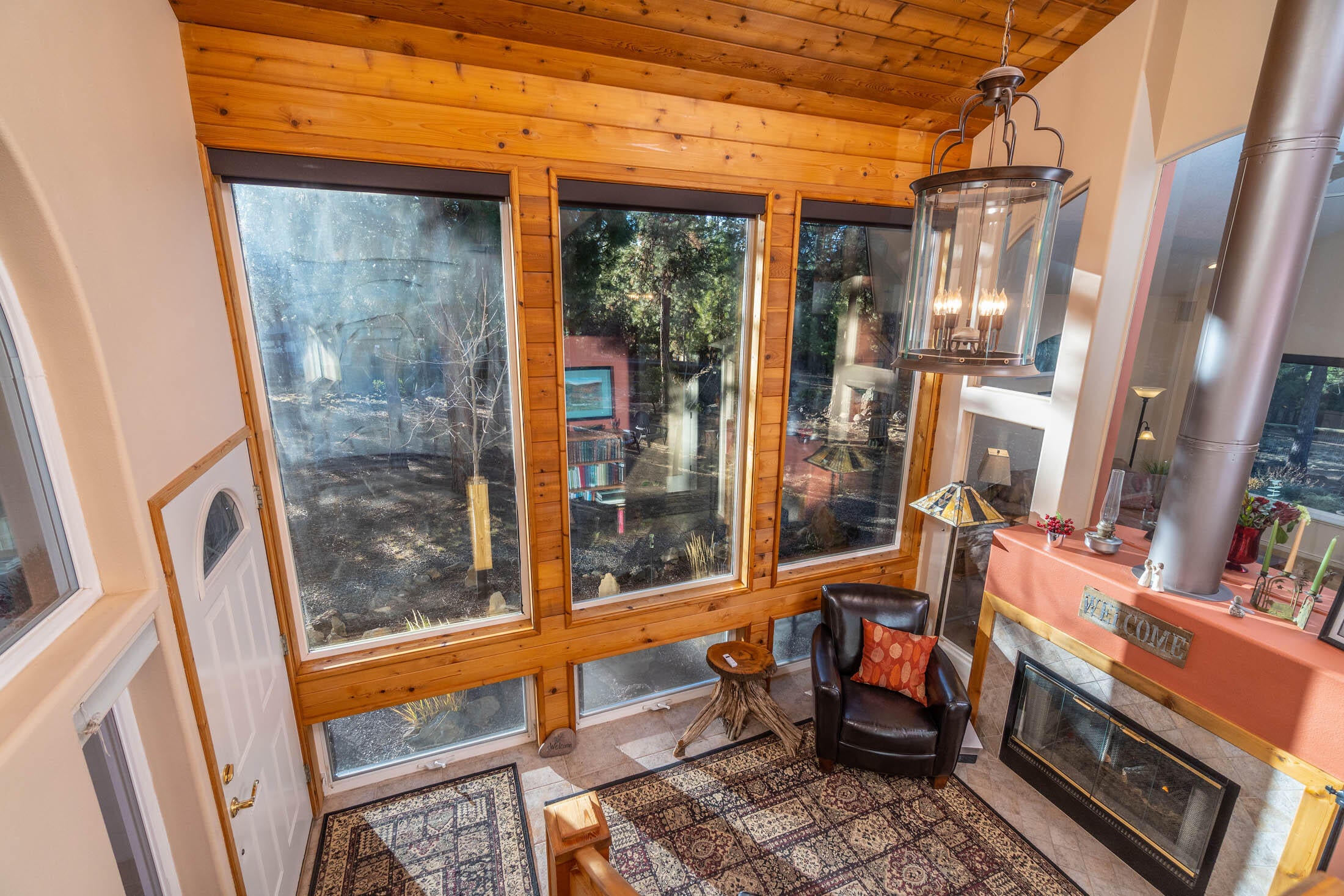 60205 Crater Road Bend, OR 97702 - Photo 19 of 74 Sun room greets you as you enter the house.