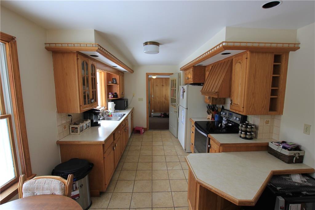 270 Sunset Road Deer Isle, ME 04627 - Photo 6 of 28 Kitchen looking towards mud room/entry