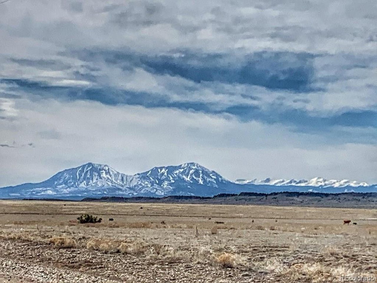 a view of lake with mountain