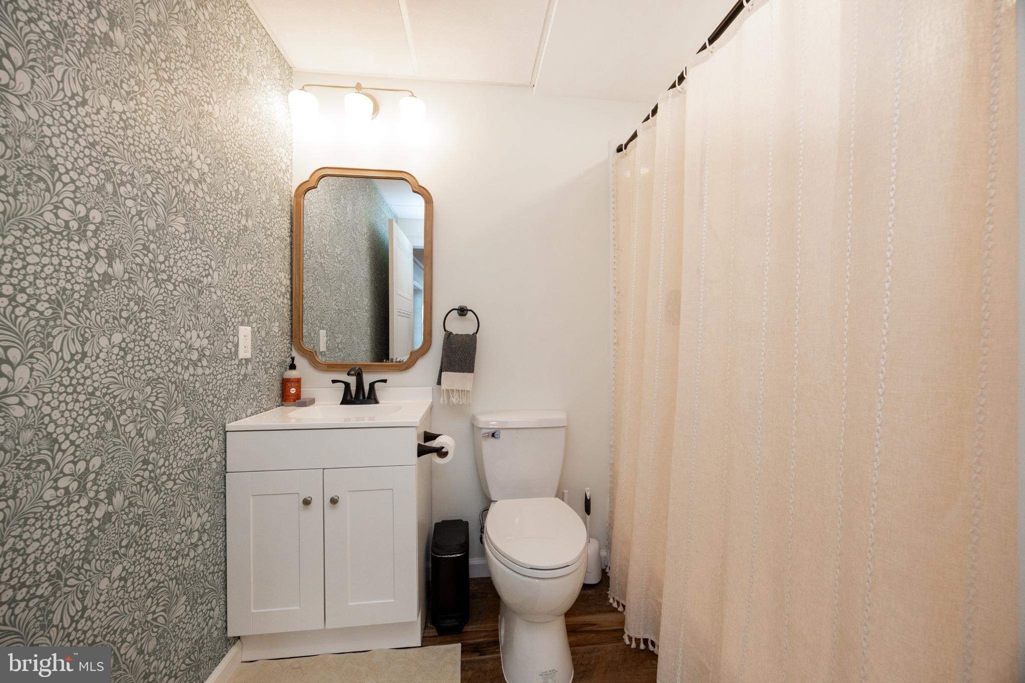 509 Kolb Road Spring City, PA 19475 - Photo 43 of 67 Charming bathroom with floral accents.