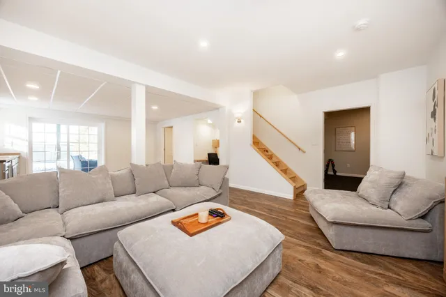 a view of a car parked in front of a house