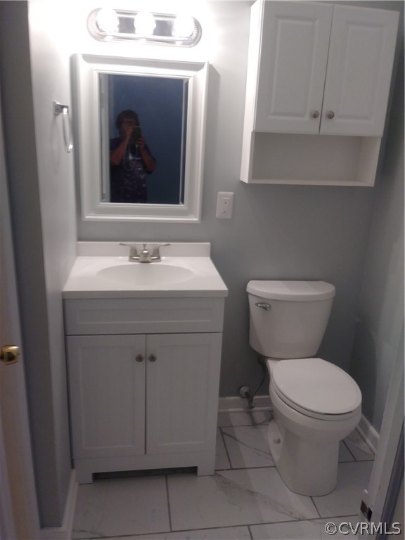 10054 Purcell Road Richmond, VA 23228 - Photo 10 of 18 Just redone half bath off master bedroom that goes
