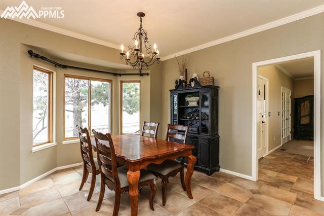 42745 Pearson Ranch Loop Parker, CO 80138 - Photo 11 of 36 Formal Dining Room