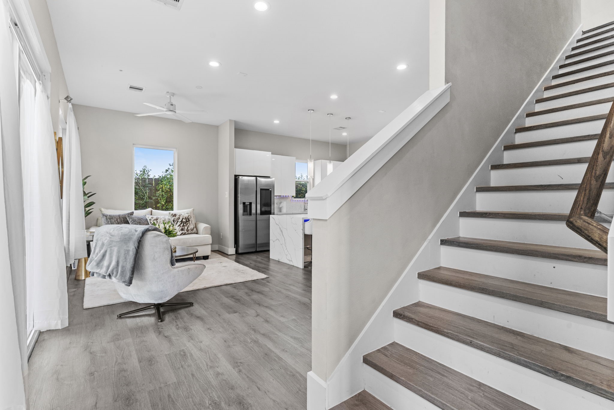 851 Prosper Street Houston, TX 77088 - Photo 11 of 50 a view of entryway and hall with wooden floor