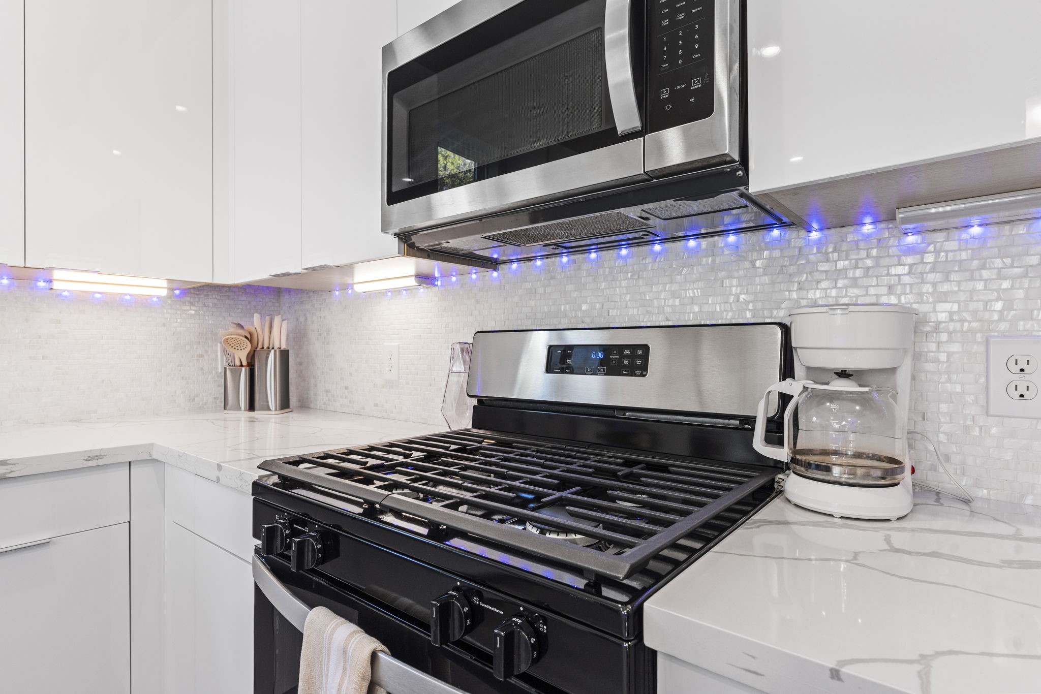 851 Prosper Street Houston, TX 77088 - Photo 22 of 50 a stove top oven sitting inside of a kitchen