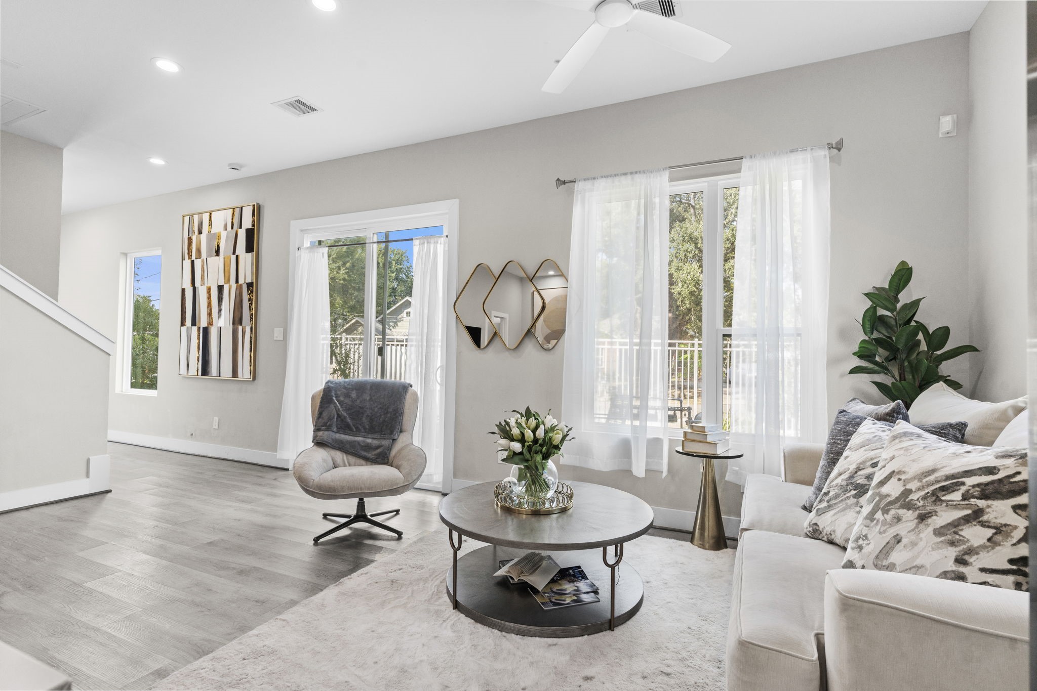 851 Prosper Street Houston, TX 77088 - Photo 24 of 50 a living room with furniture a window and a potted plant