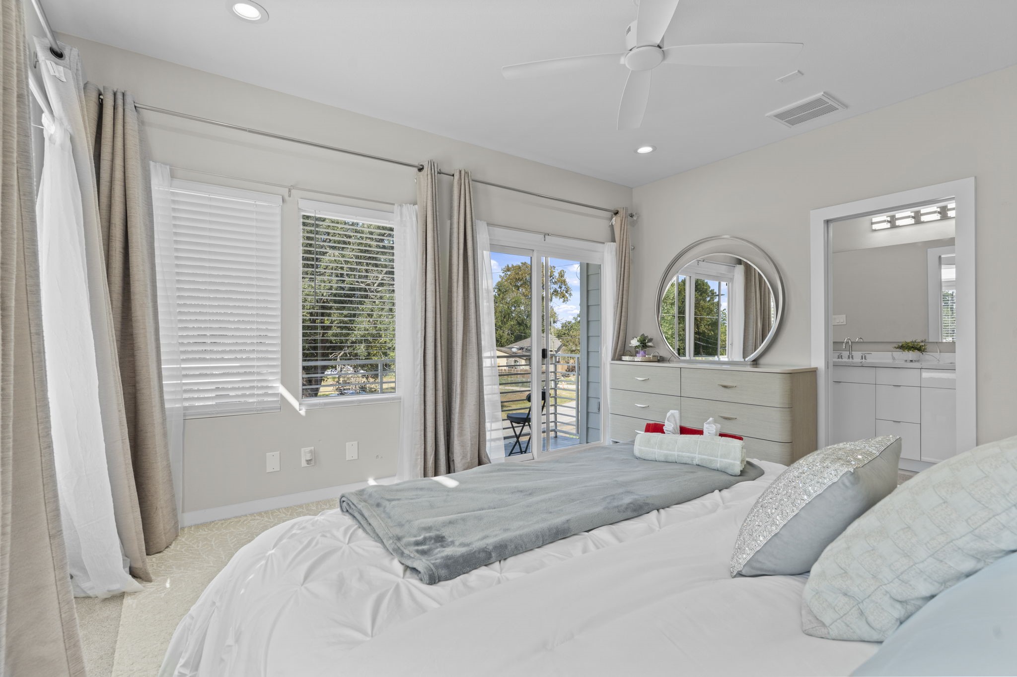 851 Prosper Street Houston, TX 77088 - Photo 36 of 50 a bedroom with a large bed and a window