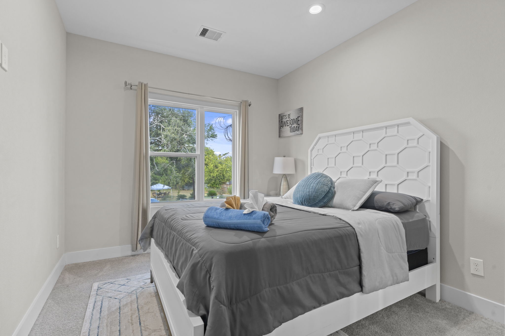 851 Prosper Street Houston, TX 77088 - Photo 44 of 50 a bedroom with a bed and a window