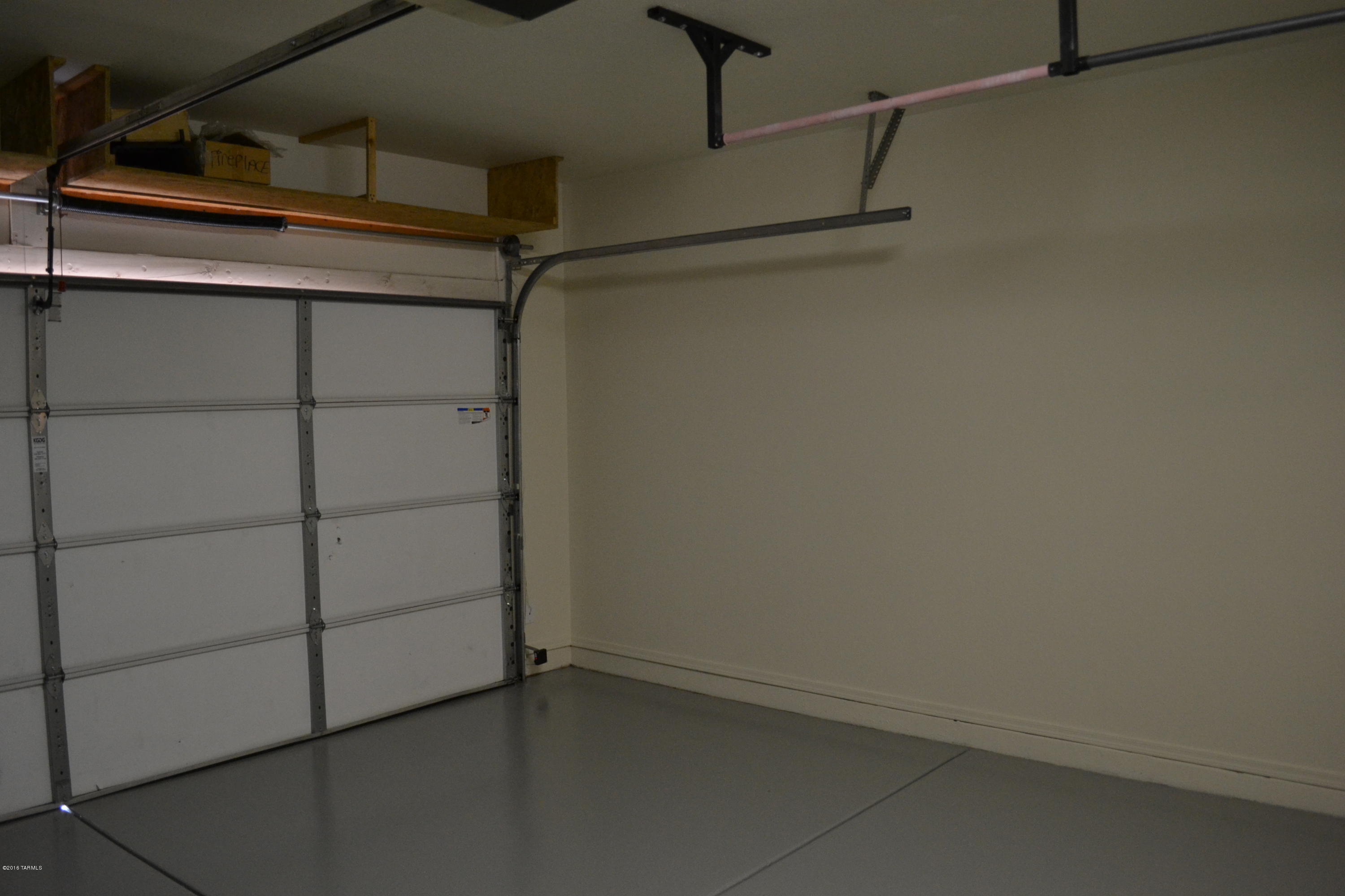 5640 North Cherokee Ridge Road Tucson, AZ 85750 - Photo 37 of 39 a view of a room with racks on the wall