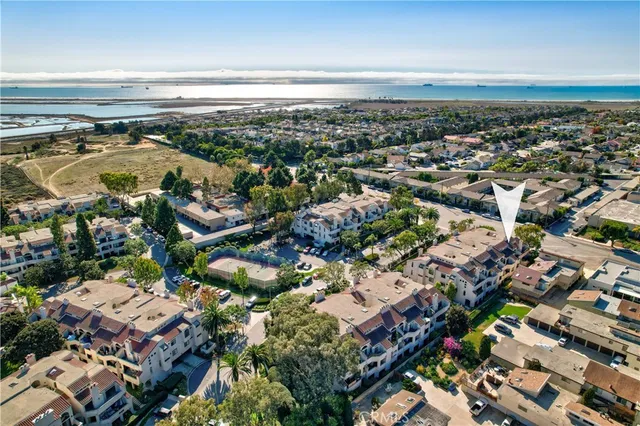 an aerial view of a city with lots of residential buildings