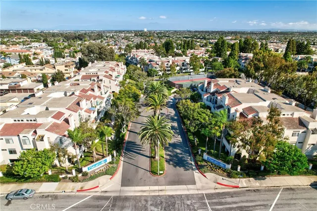 a view of a swimming pool with an outdoor seating